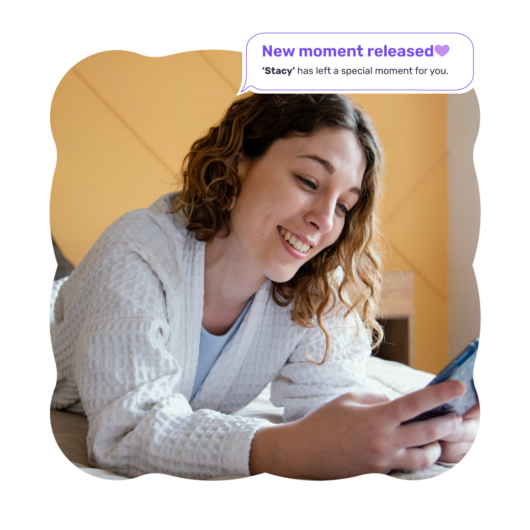 Young woman receives a message in the My Heartspace app.